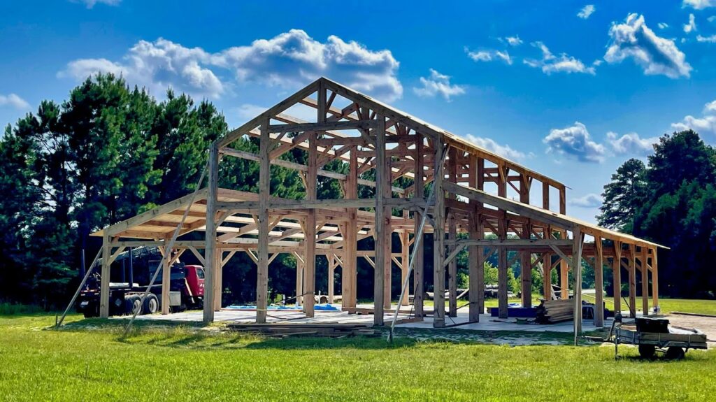 pole barn vs metal building: A post-frame building under construction