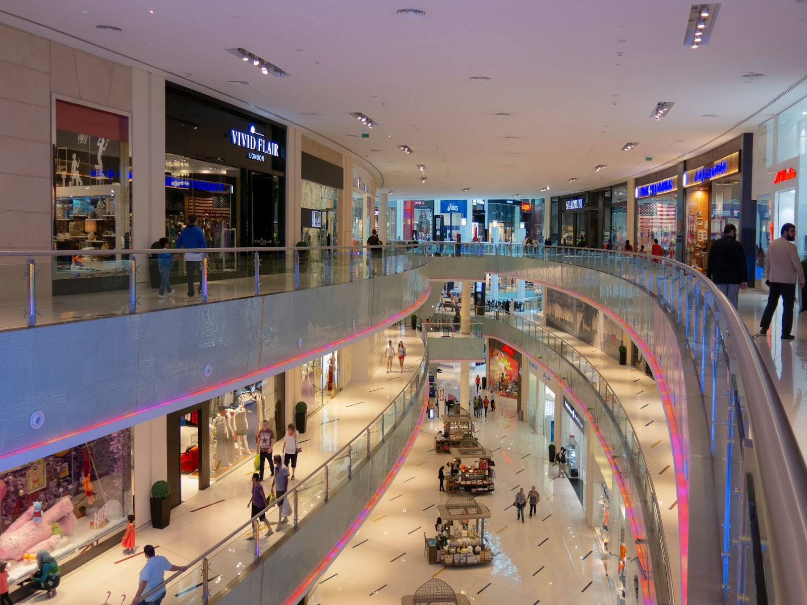 A shopping mall filled with people.