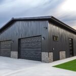 Black Steel Garage with stone facade