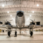 Airplane Hangar with Airplane inside