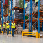 Warehouse Workers walking through an organized warehouse