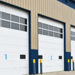 Exterior view of a small bay industrial flex space building with multiple overhead garage doors, designed for warehouse, contractor, and commercial tenant use.