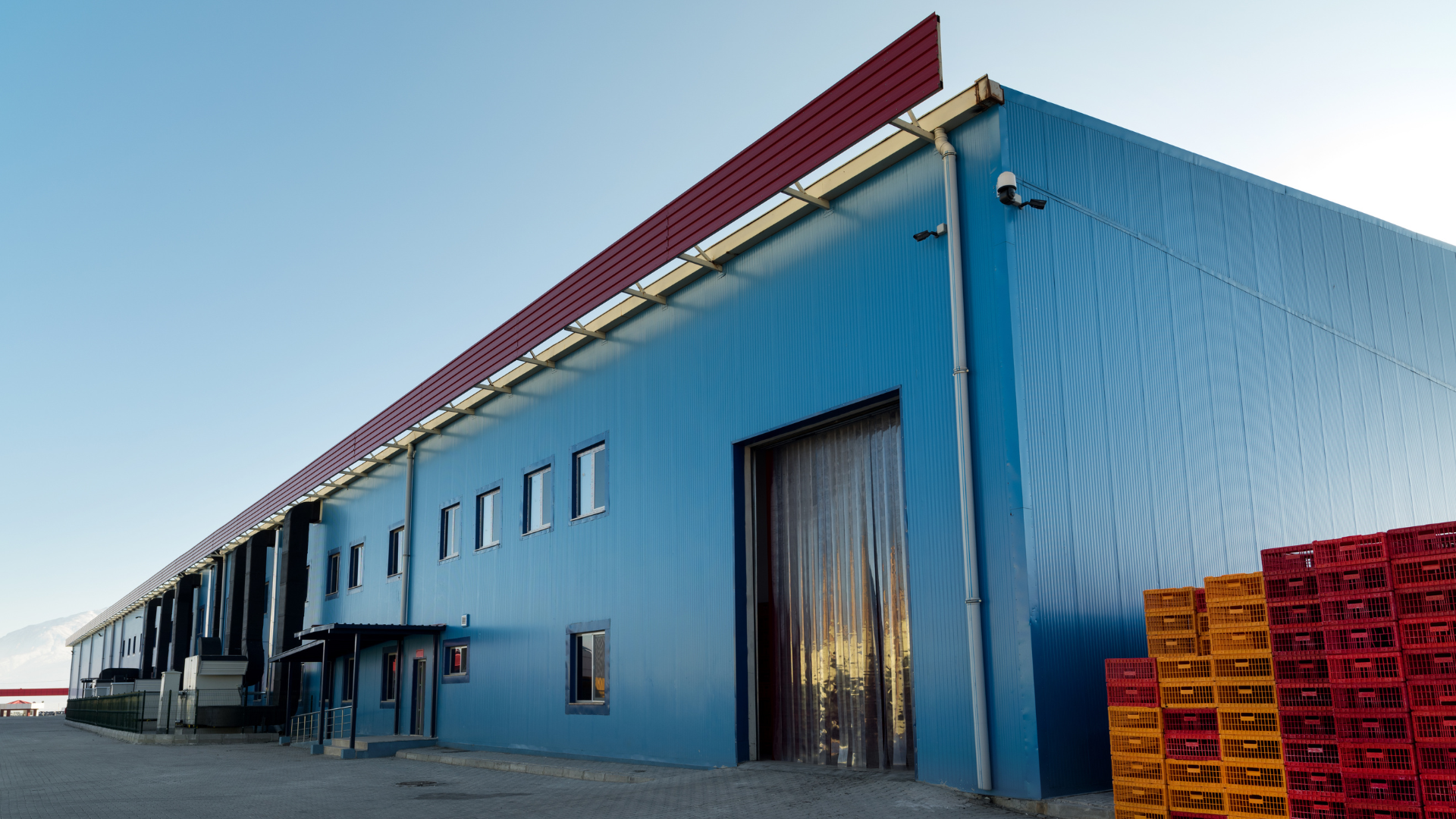 Temperature-controlled industrial building with insulated metal panel construction.